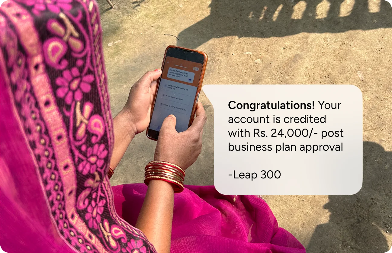 Beneficiary receiving grant notification on phone